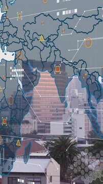 Animation of world map and data processing against aerial view of cityscape