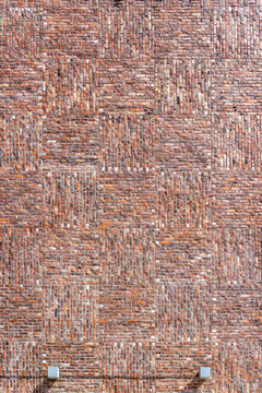 Brick wall with functionalist funkis style pattern