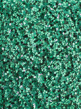 Green sequin fabric texture background