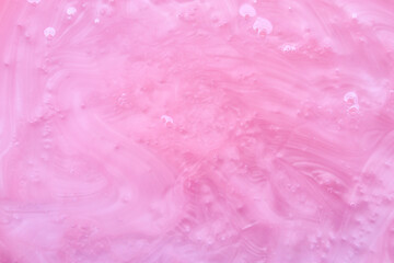 Fototapeta premium Bright pink thick cosmetic gel soap background and texture
