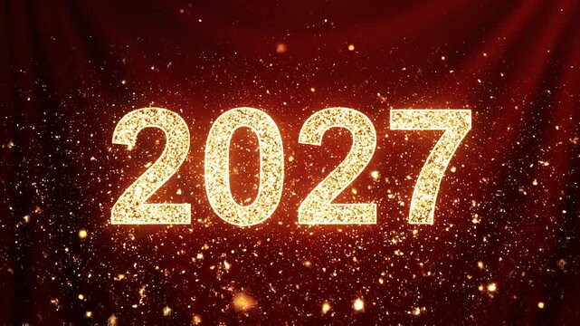 Golden 2027 text dissolving into particles against a dark red velvet background with subtle light flares