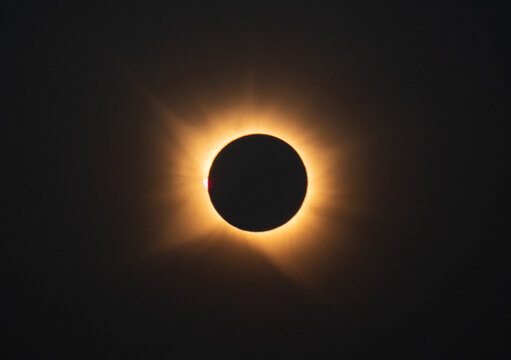 The suns corona glows brightly during a total solar eclipse