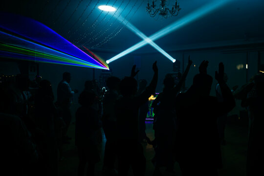 Unrecognizable people dancing in a nightclub
