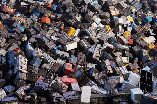 Pile of Used Car Batteries Prepared for Recycling