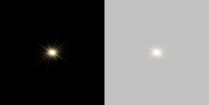 Two golden starburst light flares shine against a black background. The radiating beams spread symmetrically with a soft and subtle glow effect. This image is ideal for decorative lighting.