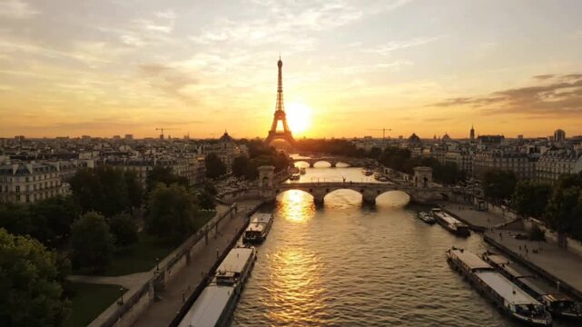 Eiffel tower silhouette at sunset aerial view over seine river with historic bridges and city skyline in paris france providing iconic cinematic cityscapes.
