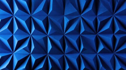 Fototapeta premium The image shows a blue origami folded surface with geometric facets designed on a paper-like backdrop. There is space for text.
