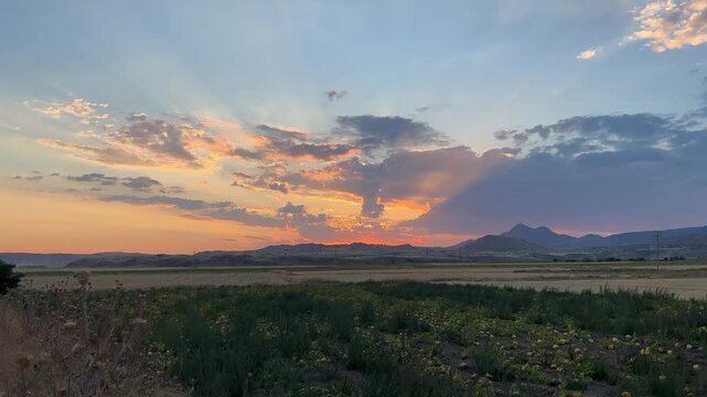 Sunset Over Farmland Near Develi with Mountain Silhouettes in Kayseri Turkey