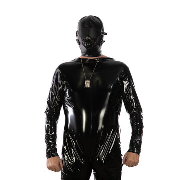 Fetish man in black latex isolated on white background