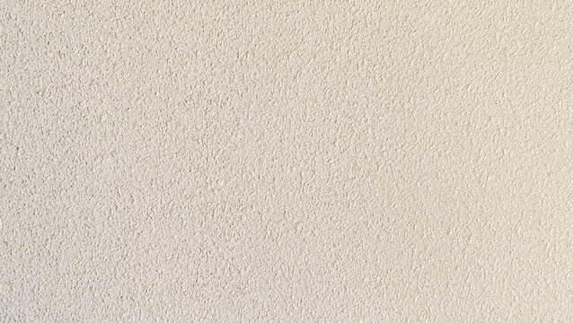 Off white fine stippled plaster wall rendering texture background with smooth grain