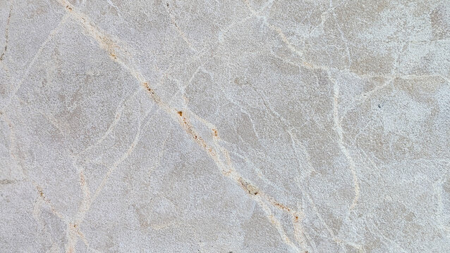 Light grey veined stone tile texture background with fine natural marbling
