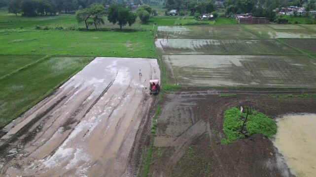 Aerial View of Indian Farmers Preparing Paddy Fields in Rural Village India