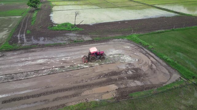 Aerial View of Indian Farmers Preparing Paddy Fields in Rural Village India
