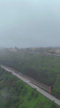 Vertical Aerial View of Lonavala Hill Road in Monsoon Pune