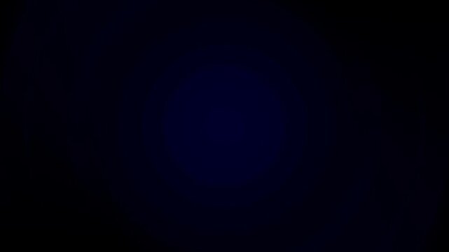 Dark blue abstract background with a subtle central circular gradient glow and vignette effect