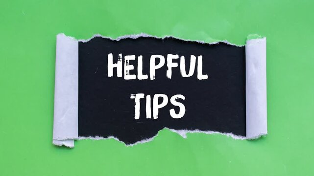 Helpful tips message writing on ripped torn paper background