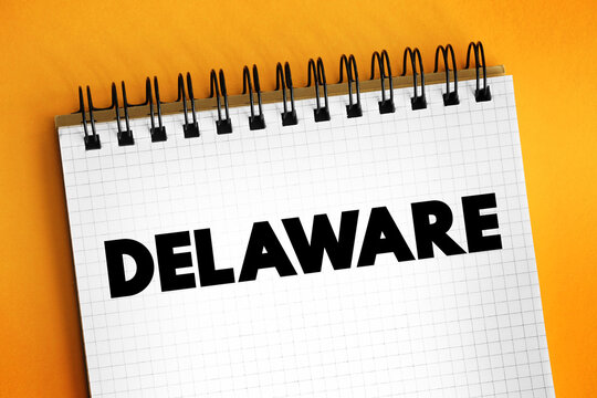 Delaware is a state located on the east coast of the United States, text concept on notepad