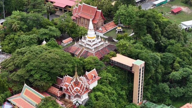 An aerial view of Wat Phra Kho in Songkhla province captured by a drone camera during the daytime.