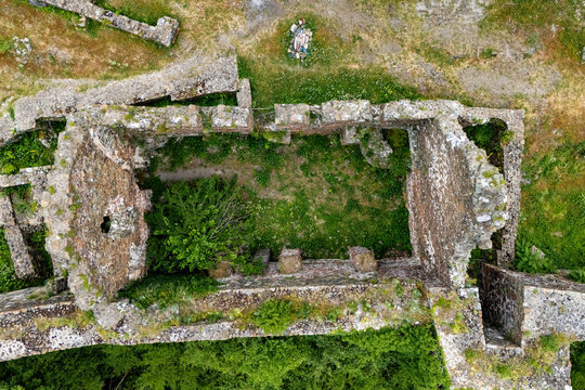 Ruins of medieval fortress Maglic on top of hill by the Ibar river in Serbia. On the wall of medieval fortress Maglic