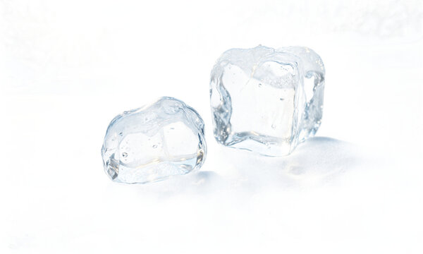 Ice cubes frozen clear two transparent melting ice blocks isolated on a transparent background for cooling beverages and refreshing themes