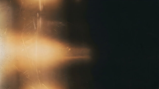 Vintage Film Light Leak Texture with Scratches on a Black Background