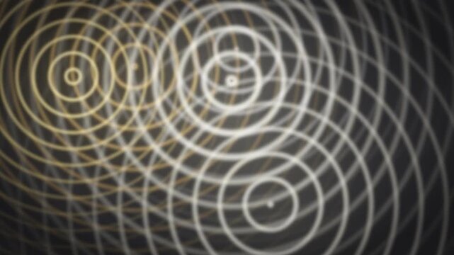 Concentric ripple rings sonar radar waves expanding glowing seamless loop in bright gold tones