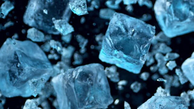 Ice cubes exploding and floating through the air in ultra slow motion at 1000 fps, creating a spectacular frozen burst with crystal-clear texture, energy and dynamic movement.