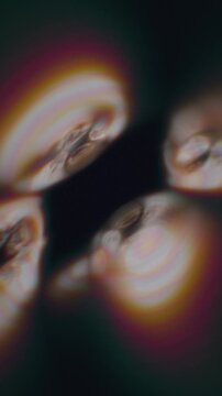 Distorted luminous portals rotate inside a dark cosmic chasm in a vertical 3D animation with eerie chromatic glow for mobile horror stories and teasers