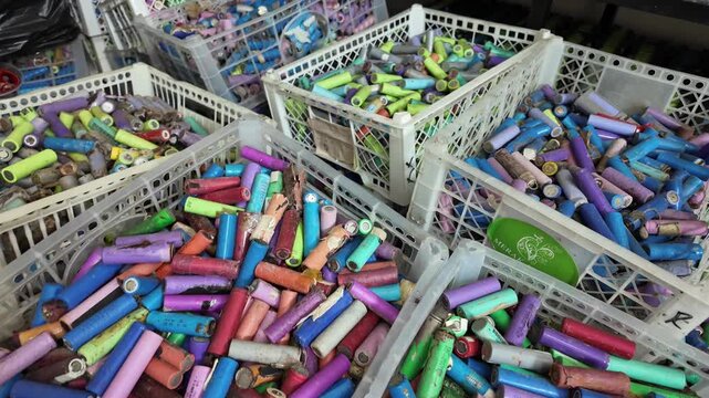 18650 lithium-ion battery cells ready for recycling and processing. Electronic waste (e-waste), sustainable energy management, and battery reuse initiatives