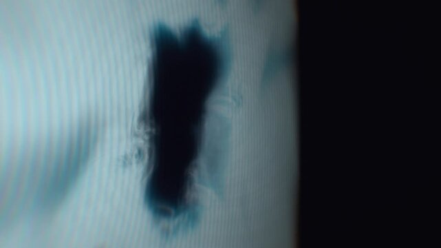 Anomalous dark entity manifests through scanline interference in a chilling 3D animation with cold blue tones and digital distortion for psychological thriller titles