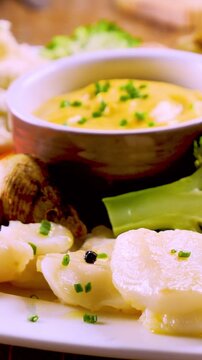 cold buffet platter with aioli, seafood and fresh vegetables- vertical video