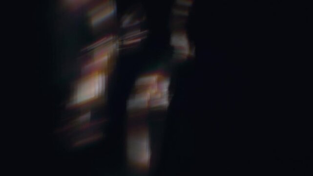 Prismatic lens distortions flash through deep cosmic shadows in a mysterious 3D animation motion loop for paranormal thriller title sequences