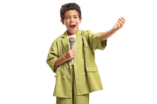 Boy in a green suit singing with a microphone