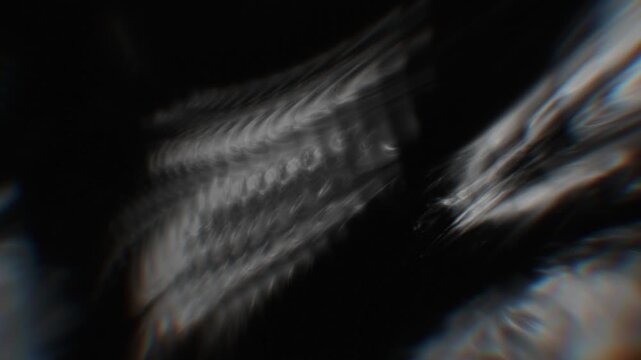 Distorted crystal textures ripple across a black void in a haunting monochrome 3D render with ghostly chromatic refraction for dark intros