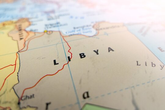Map of Libya with flare from top right corner. Selective focus on label, close-up view