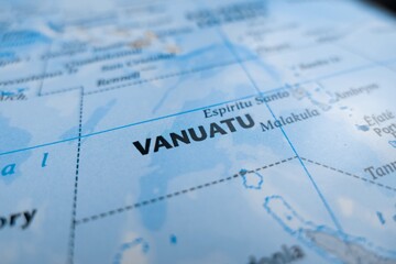Naklejka premium Map of Vanuatu styled in grey color. Selective focus on label, close-up view