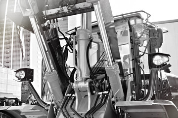 Hydraulic cylinders and boom of construction machinery © Sergey Ryzhov