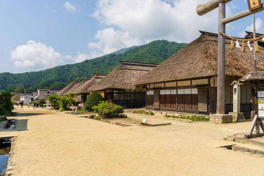 Historic streetscape of Ouchi-juku lined with traditional thatched-roof houses in Fukushima