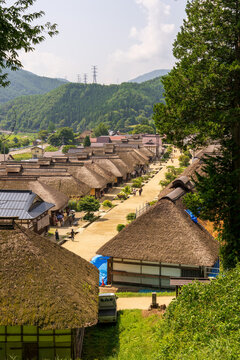 Historic streetscape of Ouchi-juku lined with traditional thatched-roof houses in Fukushima