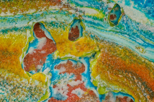 Thin film perforation and localized fluid layer rupture in multiphase polymer dynamics, captured through a microscope lens under high magnification