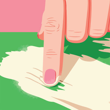 Finger pointing at paper on green surface, abstract background