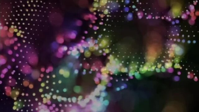 Vibrant abstract background featuring beautiful bokeh lights and a scattering of glowing particles on a dark gradient effect