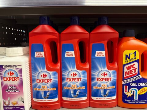 Mallorca, spain, august 30, 2026, carrefour expert and wc net drain cleaner products on a supermarket shelf in andratx, spain