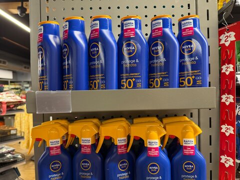 Mallorca, spain, august 30, 2026, nivea sun sunscreen bottles on a supermarket shelf offering sun protection in andratx, spain