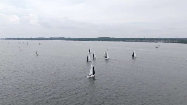 Monohull Sailboats Racing In Severn River In Annapolis, Maryland, USA. - aerial shot
