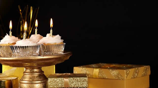 Candles Burning Smoothly Off Sided with Room for an Announcement on a Black Background