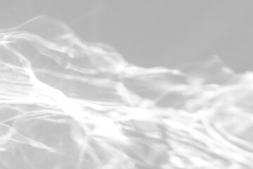 Fototapeta premium Real fine caustic ripple shadow cut out on a transparent png background with soft wavy edges. Anchors a serene wellness mockup overlay, a psychedelic and trippy design as a png overlay with room.