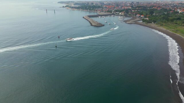 Waves Wash Onto Padang Galak Beach Sanur Harbor East Bali Indonesia Drone Track Back 4K 60FPS