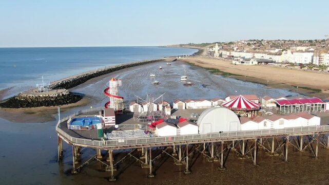 Panning aerial view Herne Bay Pier Kent closed in the COVID-19 pandemic, deserted