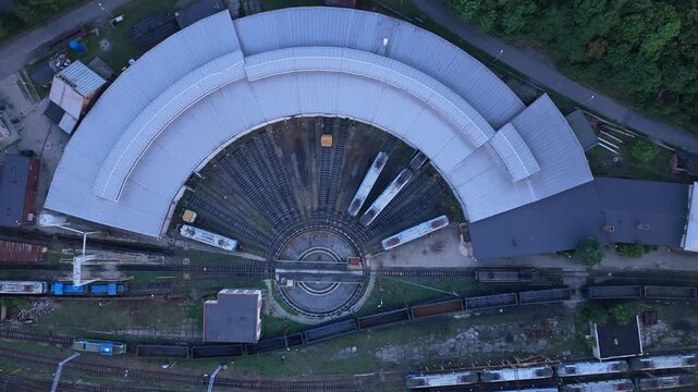 Aerial view of train depot turntable rotating cargo train